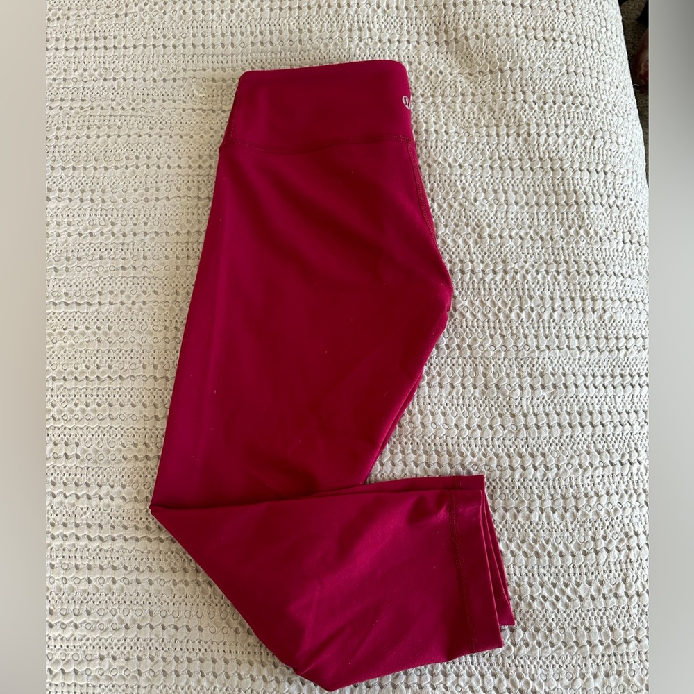 Lululemon Leggings Size 6. Mid-rise, cropped. Like new. Color is magenta.